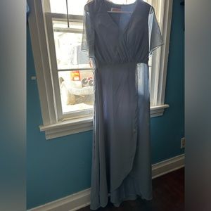 Bridesmaids dress and is new . The color is dusty blue and size 2